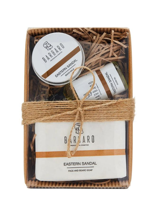 Barbaro Eastern Sandal product set in a gift box with decorative string on a white background