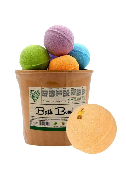 Colorful bath bombs in a paper cup with a label, on a white background