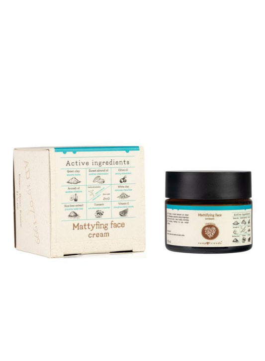 The image shows a packaged Oil Control Face Cream by Soap & Friends, with a jar beside its box. The box lists active ingredients and indicates the product is for mattifying and controlling shine.