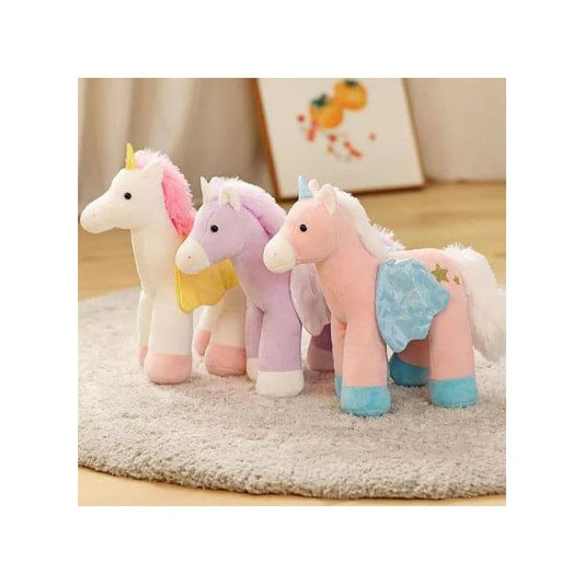 Three colorful unicorn plush toys on a carpeted floor.
