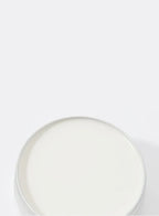 Closeup of Barbaro beard balm in a jar on a white background
