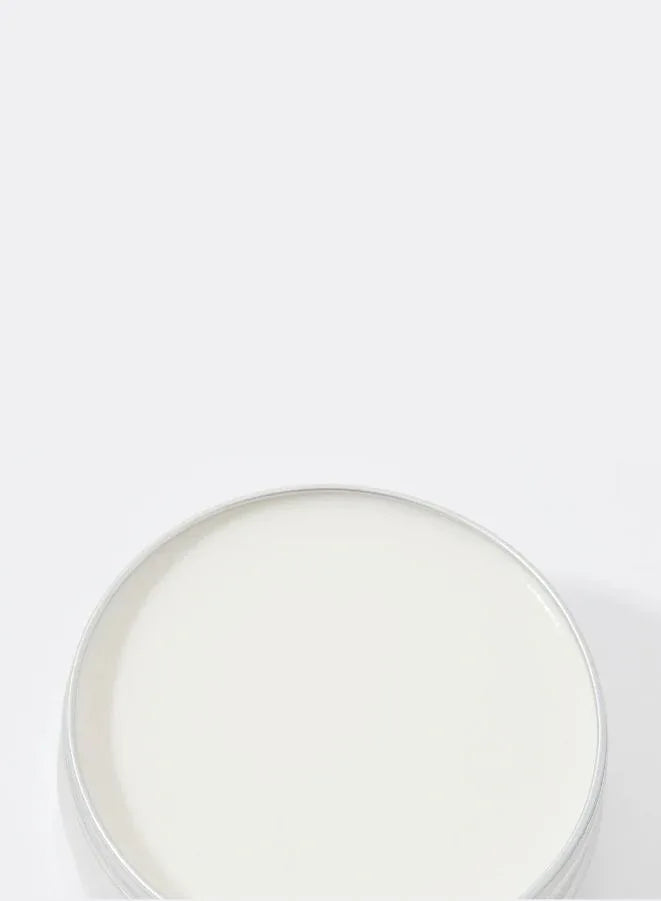 Closeup of Barbaro beard balm in a jar on a white background