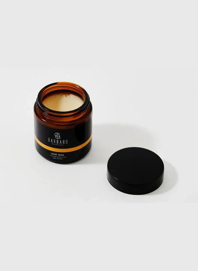 Barbaro hair wax in a jar with a black lid on a white background