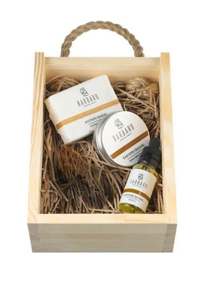 Barbaro beauty products in a wooden crate with straw lining