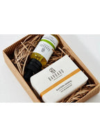 Barbaro soap and beard oil bottle in a wicker basket on a white background