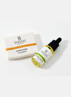 Barbaro Eastern Sandal soap bar and beard oil bottle on a white background