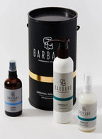 Barbaro grooming products including bottles and a large cylindrical container on a white background