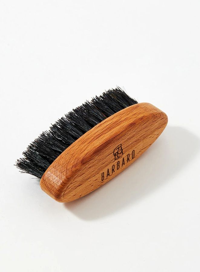 Wooden brush with black bristles on a white background, featuring the 'Barbaro' brand.