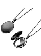 Black locket necklaces on a white background