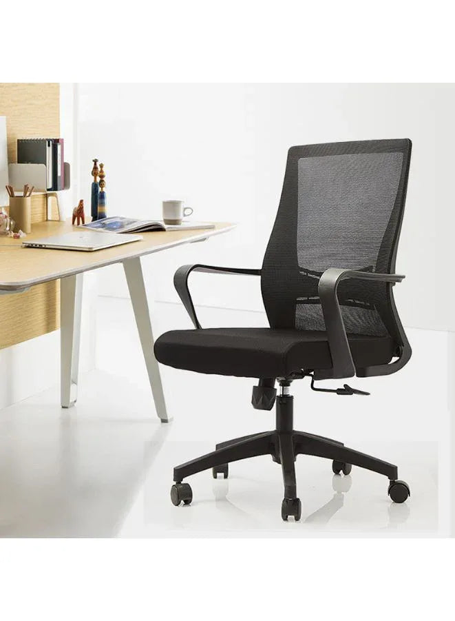 Black office chair in front of a desk with a white background