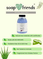 Bottle of soap and friends natural bath salt on a green background with product details.