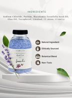 Bottle of bath salts with lavender and ingredients listed on a white background