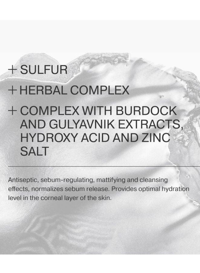 Text detailing skincare ingredients on a textured white background