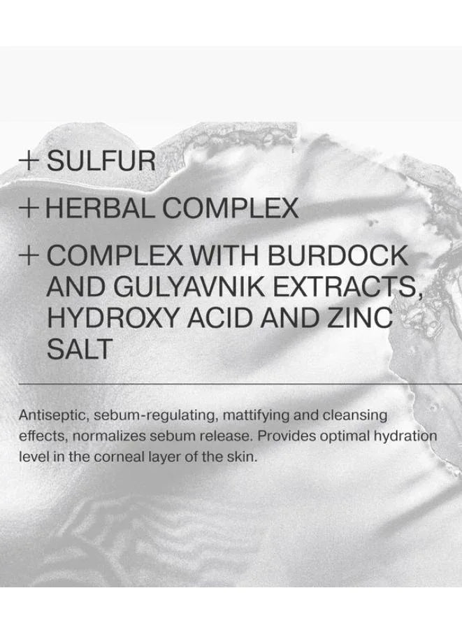 Text detailing skincare ingredients on a textured white background