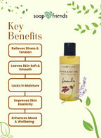 Soap & Friends massage oil bottle with key benefits listed on a green leafy background