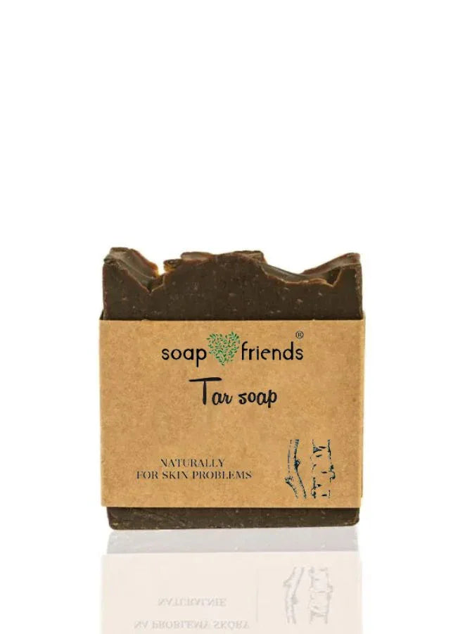 A bar of Tar Soap packaging labeled 'Soap&Friends Tar Soap', indicating its use for skin conditions such as psoriasis, acne, and dandruff.