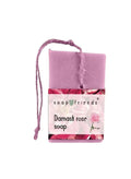 Bar of soap with a pink packaging featuring floral designs and 'soap friends' branding on a white background.