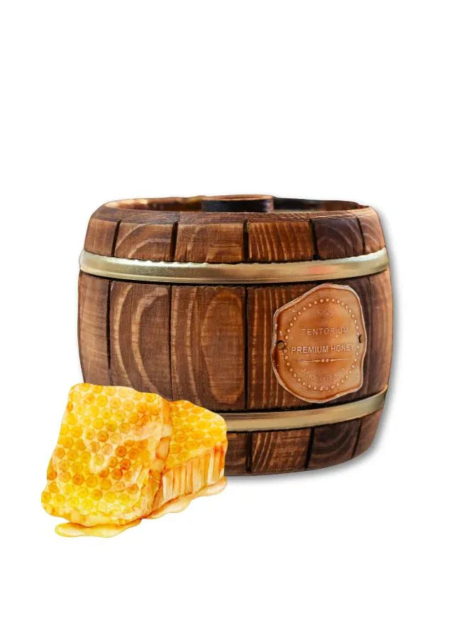 Wooden barrel-shaped container with honeycomb on a white background