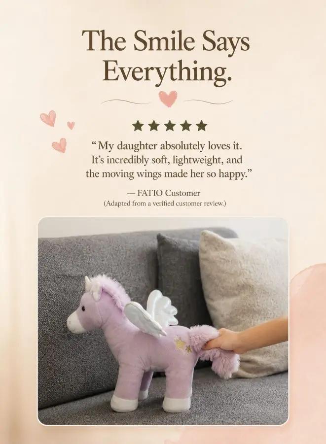 A graphic for a pink plush unicorn toy with white wings. The top text reads 'The Smile Says Everything.