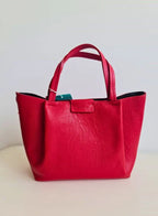 حقيبة يد جلدية متوسطة الحجم باللون الأحمر للنساء من إيفيتي