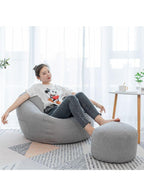 Classic Fabric Bean Bag with foot stool grey being used