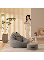 LUCKYSAC Classic Bean Bag with foot stool grey in a room