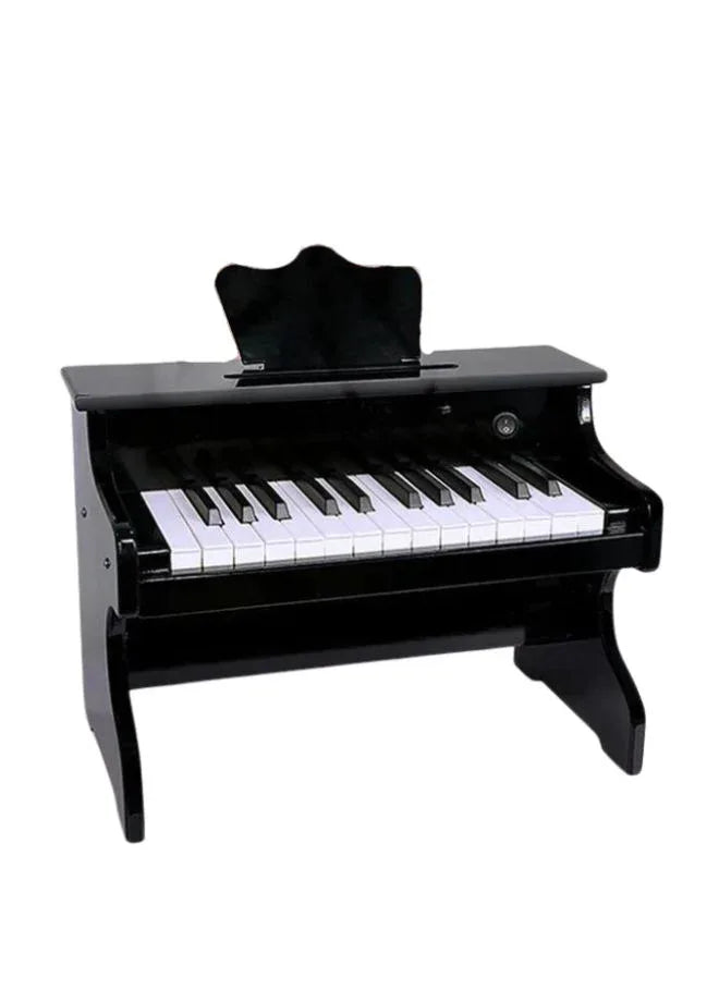 A black classic wooden piano with white and black keys for kids.
